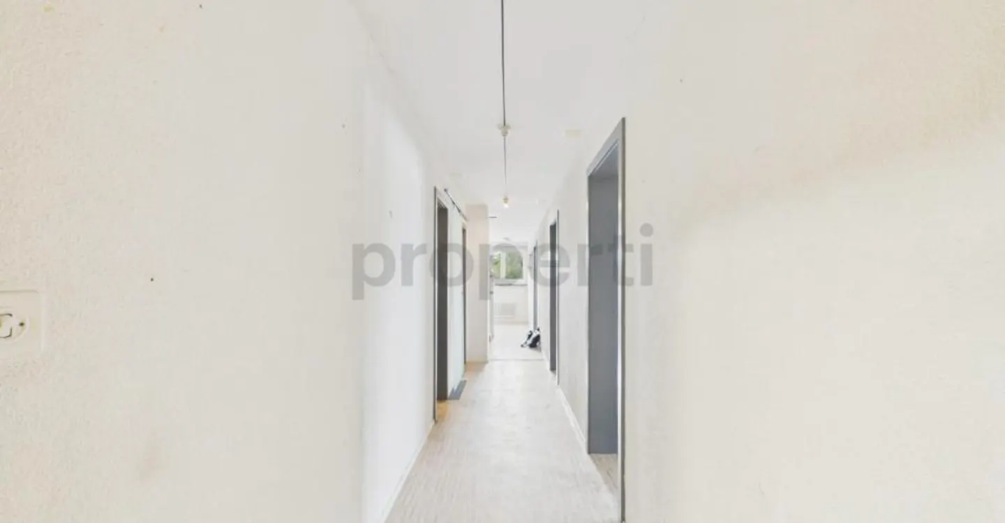 Light-Filled Living with Balcony and Distant View - Photo 7 of 10