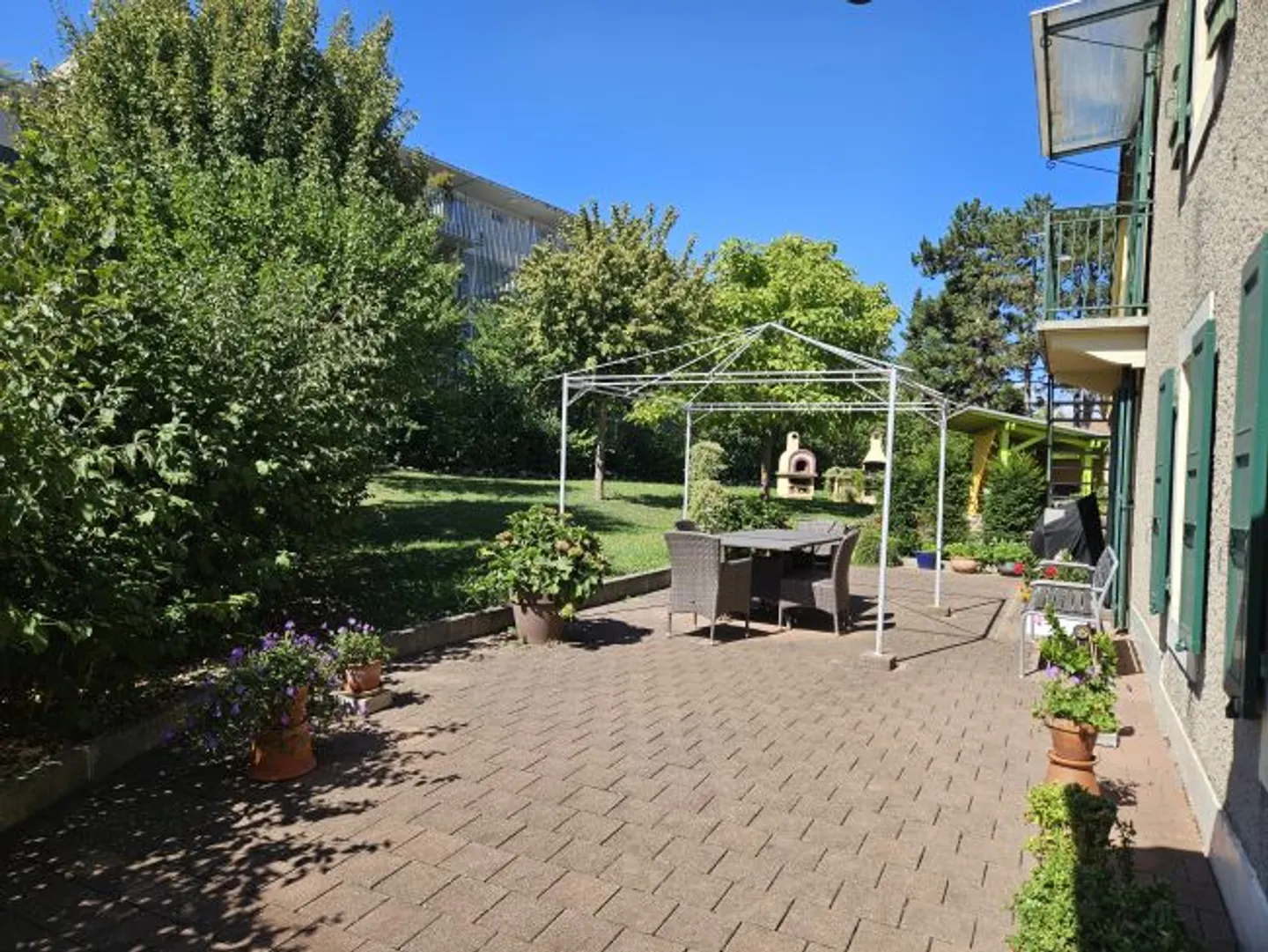 Appartement de 5 pièces avec jardin - Photo 1 sur 10
