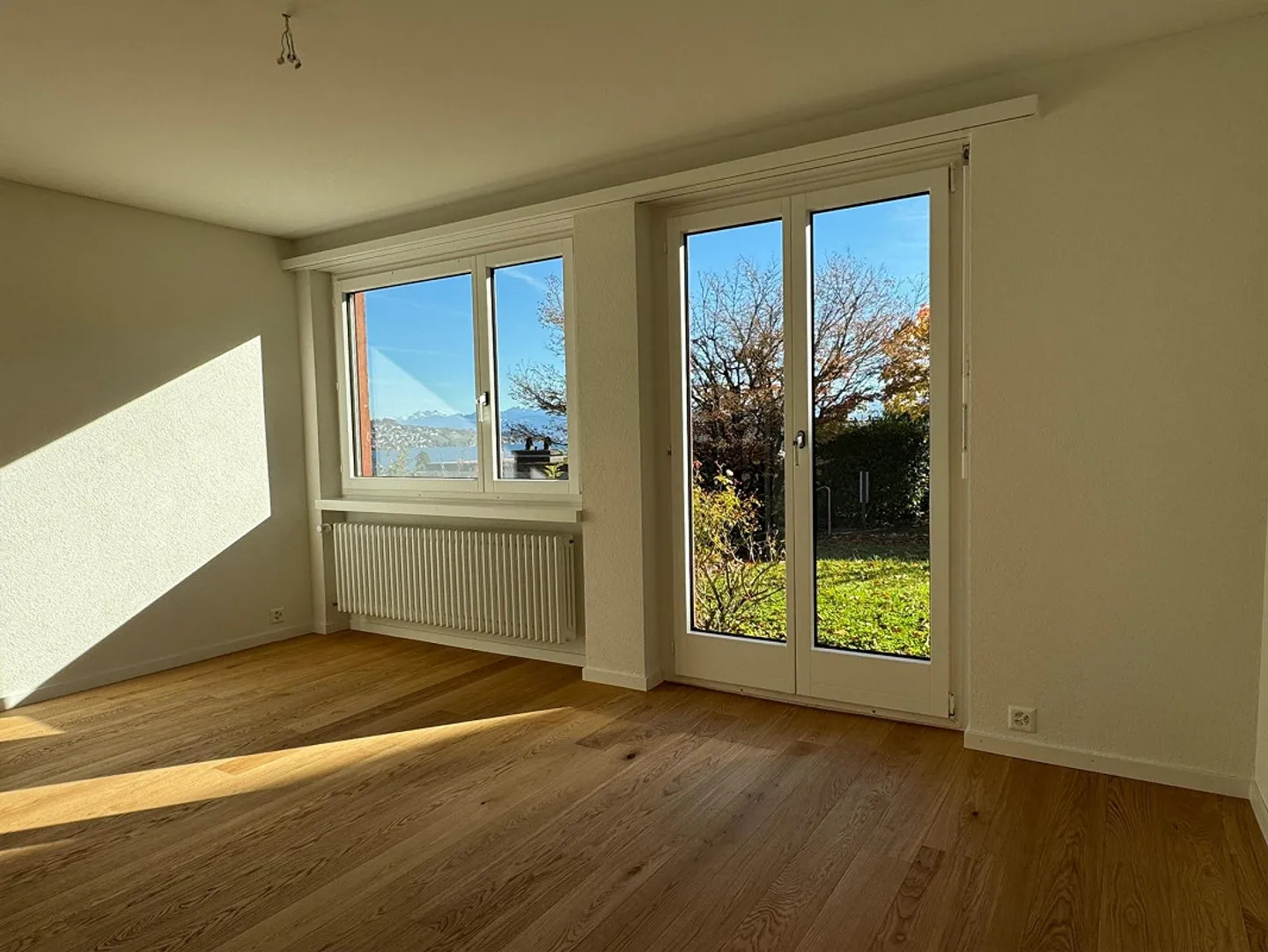 Appartamento con terrazza e vista mozzafiato sul lago e sulle montagne - Foto 11 di 16