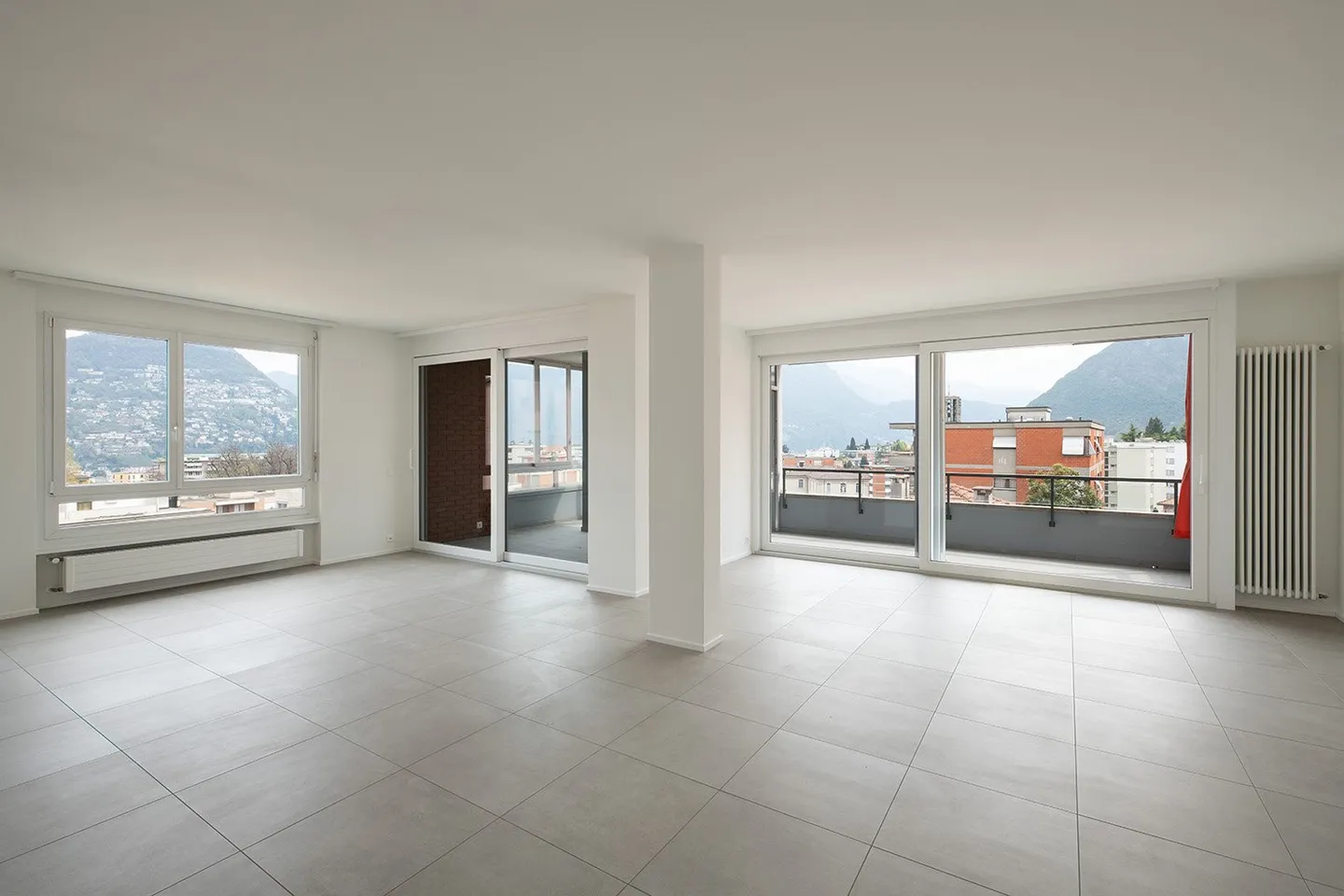 Attique avec 6,5 pièces et vue panoramique sur la ville de Lugano - Photo 4 sur 17