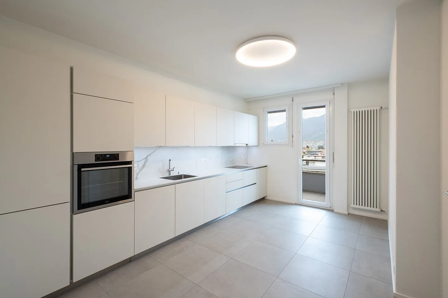 Attique avec 6,5 pièces et vue panoramique sur la ville de Lugano - Photo 5 sur 17