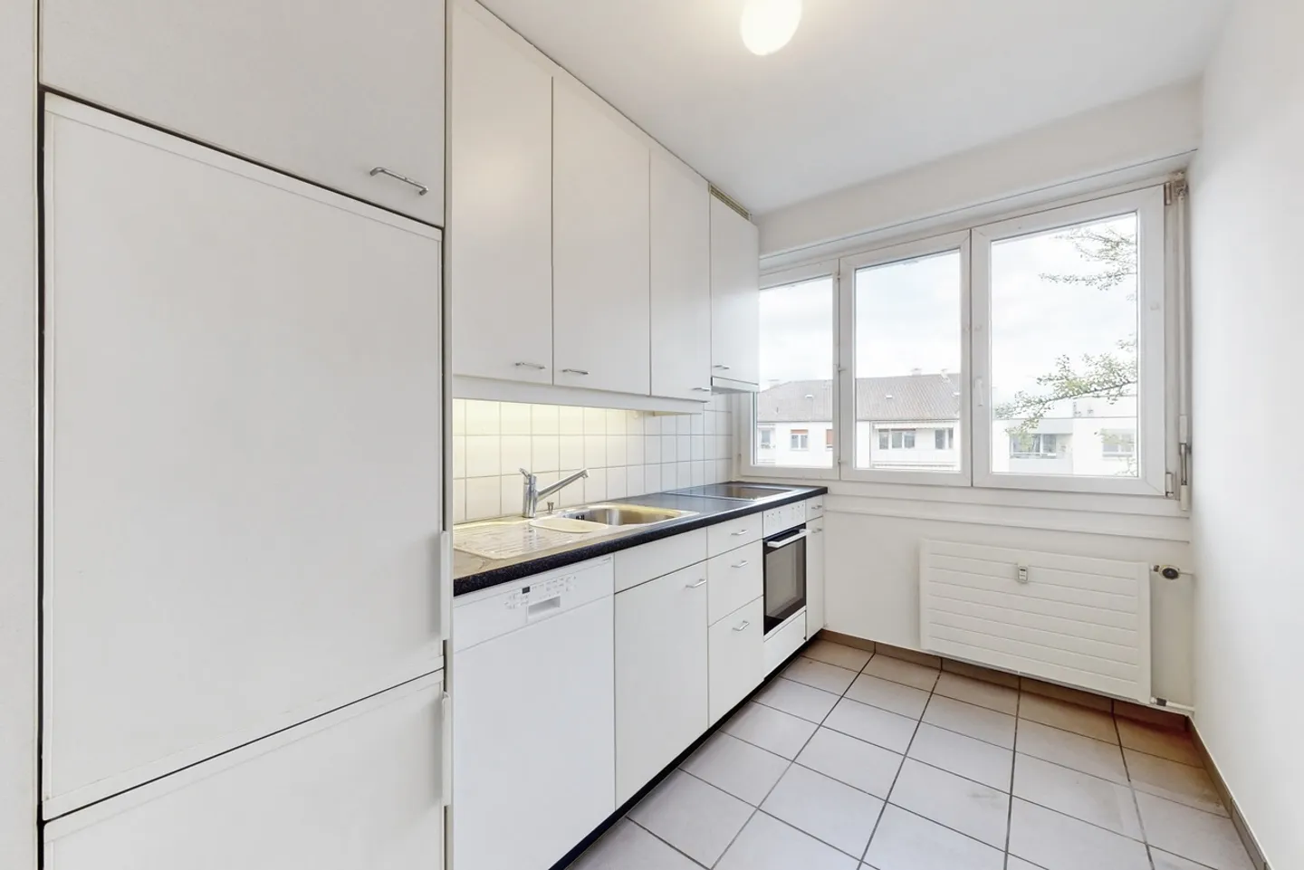 Vivre avec une vue sur les toits de Bâle - Photo 2 sur 4