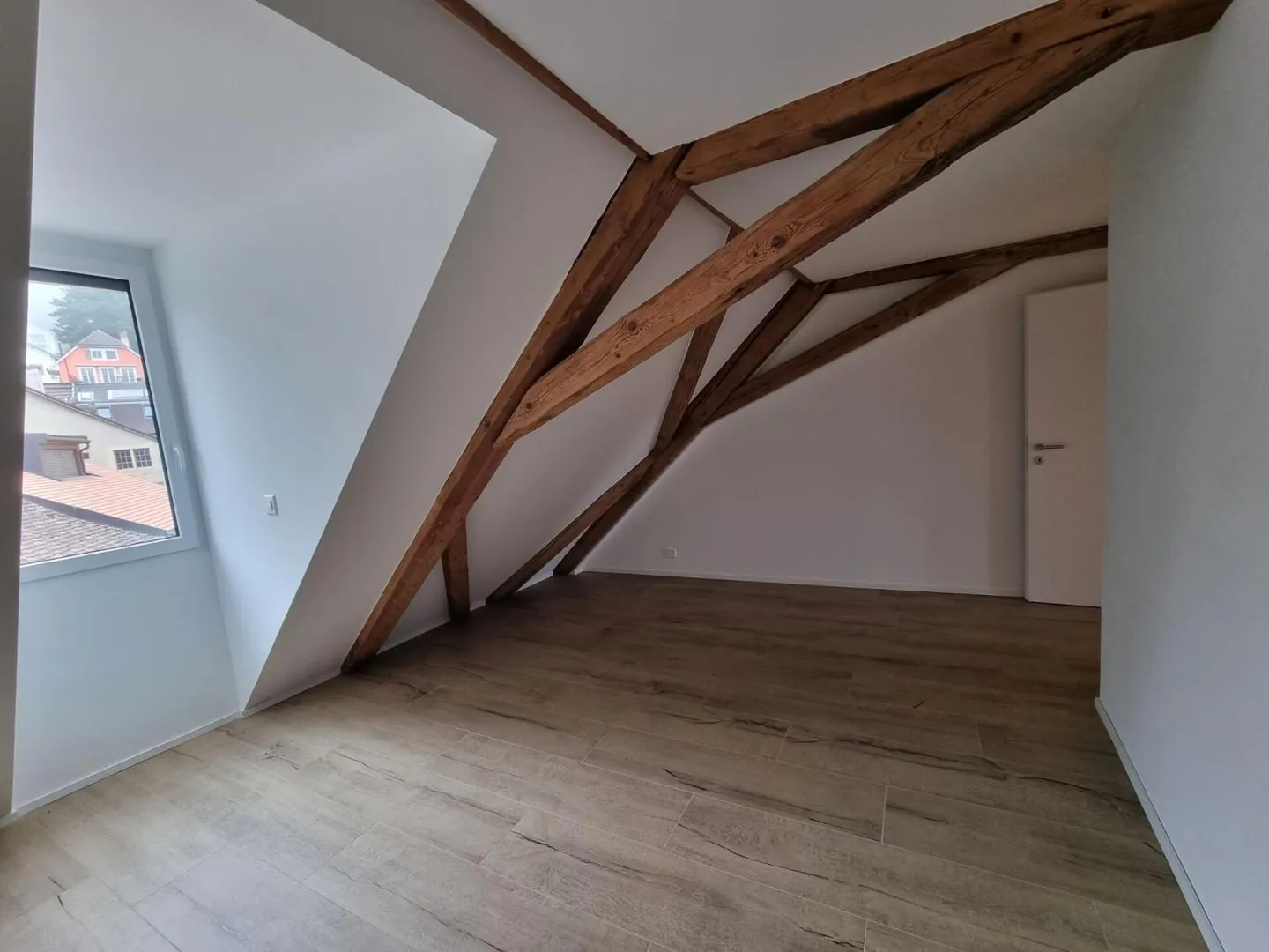 Appartement avec 2,5 pièces + espace de grenier - Photo 3 sur 8
