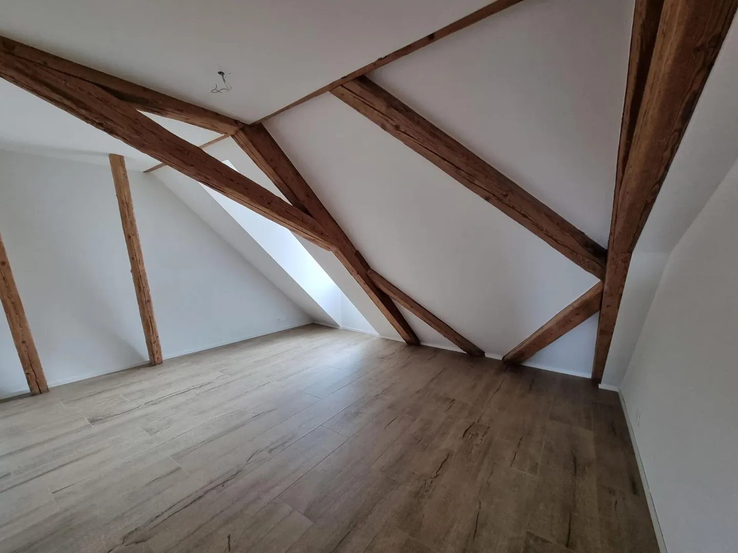 Appartement avec 2,5 pièces + espace de grenier - Photo 4 sur 8