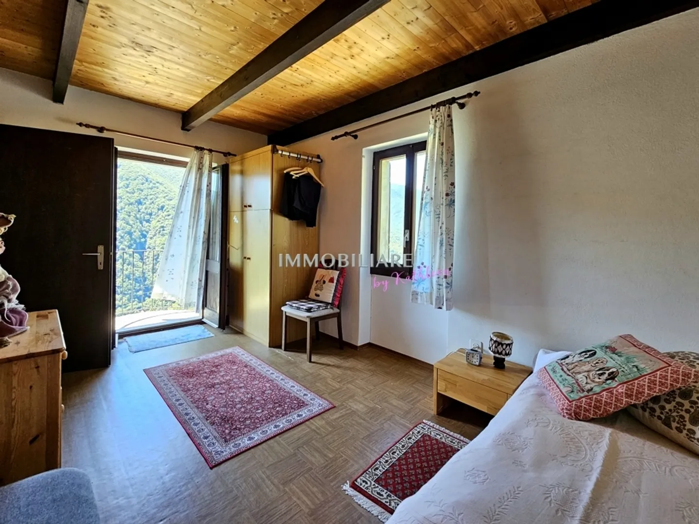 Maison tessino originale avec vue et jardin dans le noyau d'Auressio - Photo 11 sur 13