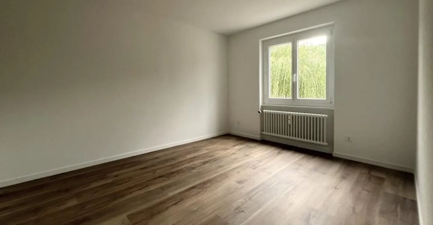 Appartement rénové au centre-ville - Photo 4 sur 6