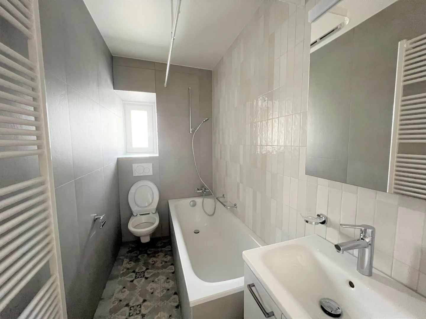 Appartement rénové 4 pièces - Photo 3 sur 8