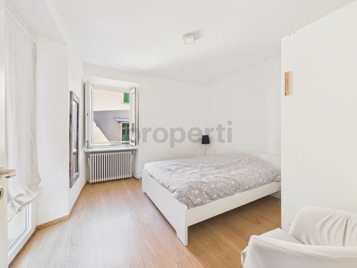 Bâtiment rénové au cœur de Contone : un charmant duplex et deux appartements déjà loués. - Photo 6 sur 13