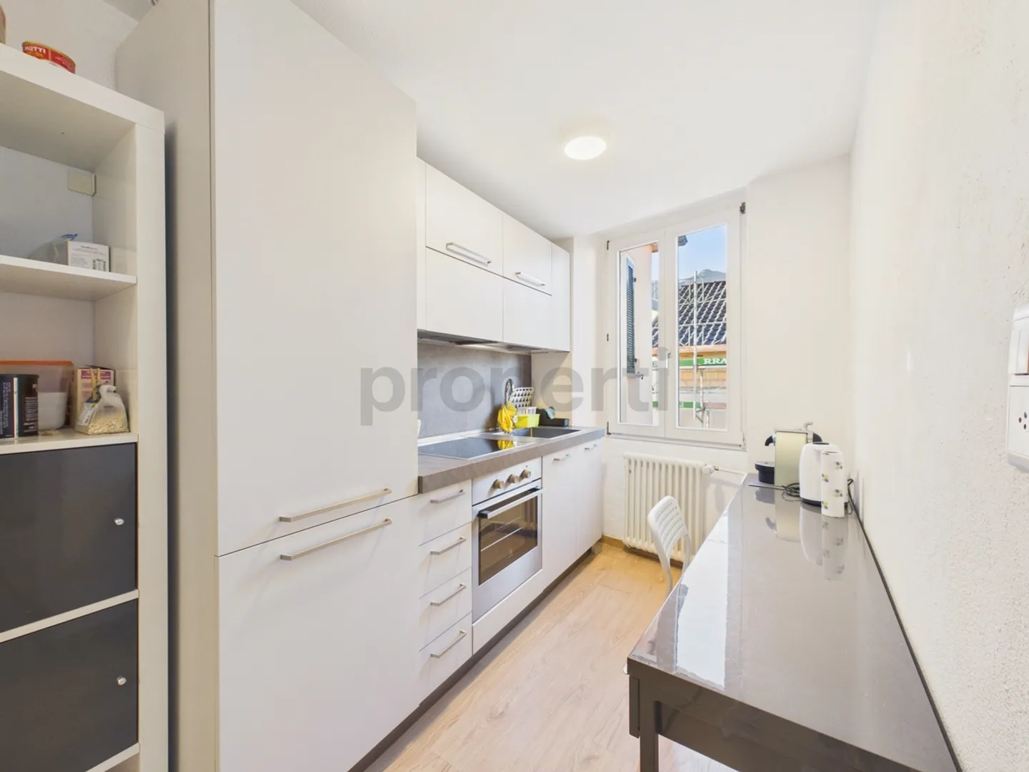 Bâtiment rénové au cœur de Contone : un charmant duplex et deux appartements déjà loués. - Photo 9 sur 13