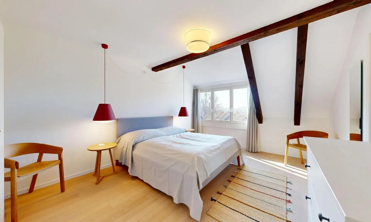 Light-flooded penthouse duplex in a quiet location in Zurich-Witikon - Photo 10 of 11