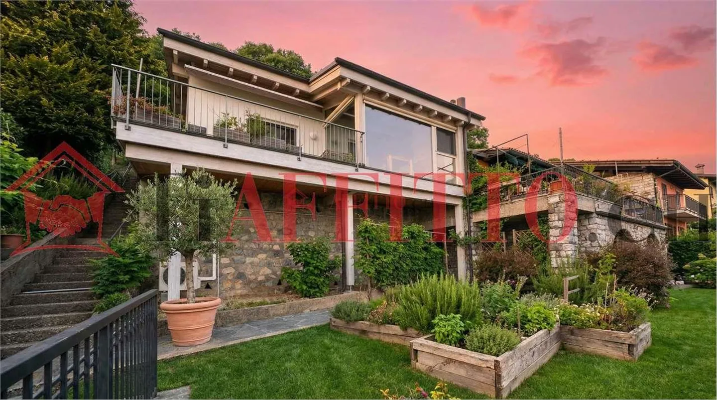 Elegante 5-Zimmer-Wohnung in Brè - Foto 1 von 13