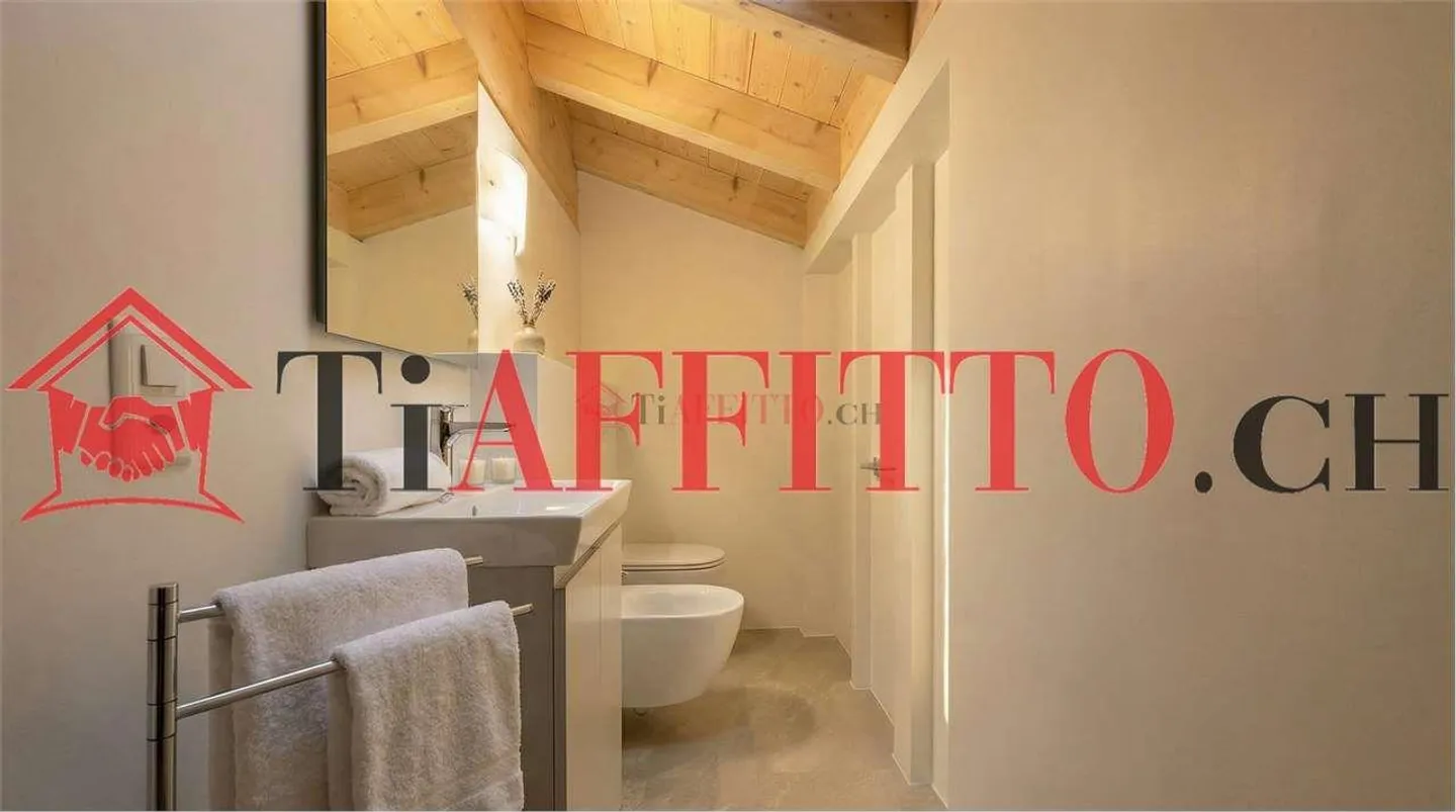 Elegante 5-Zimmer-Wohnung in Brè - Foto 12 von 13