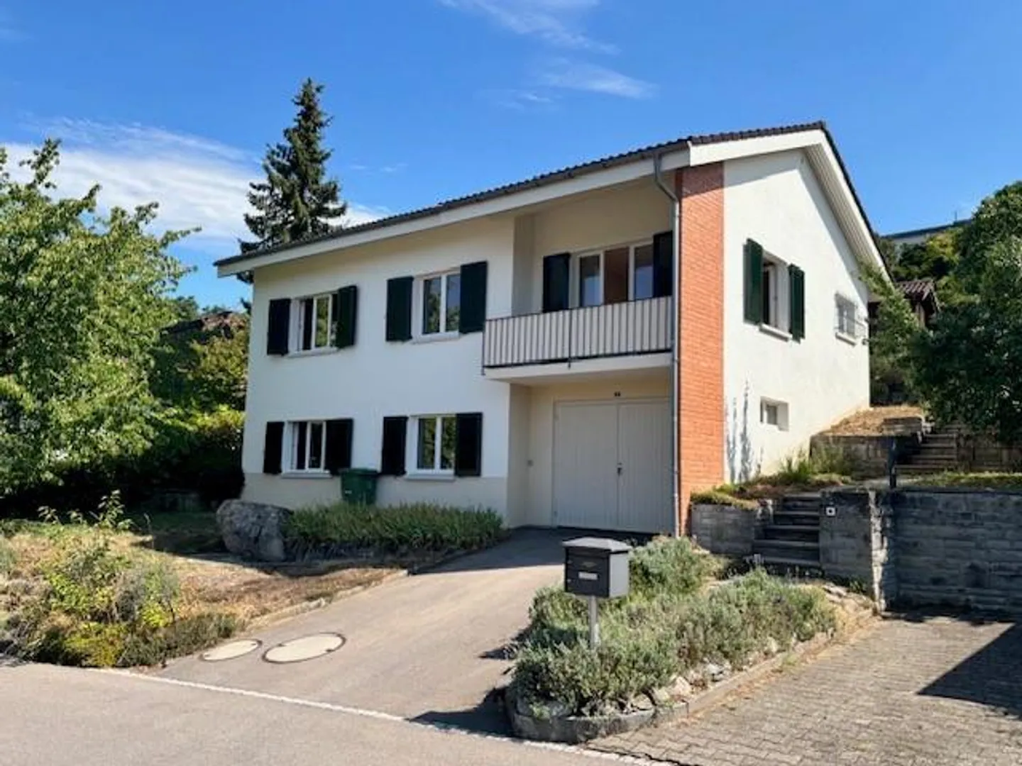 Detached single-family house in a family-friendly location - Photo 1 of 13