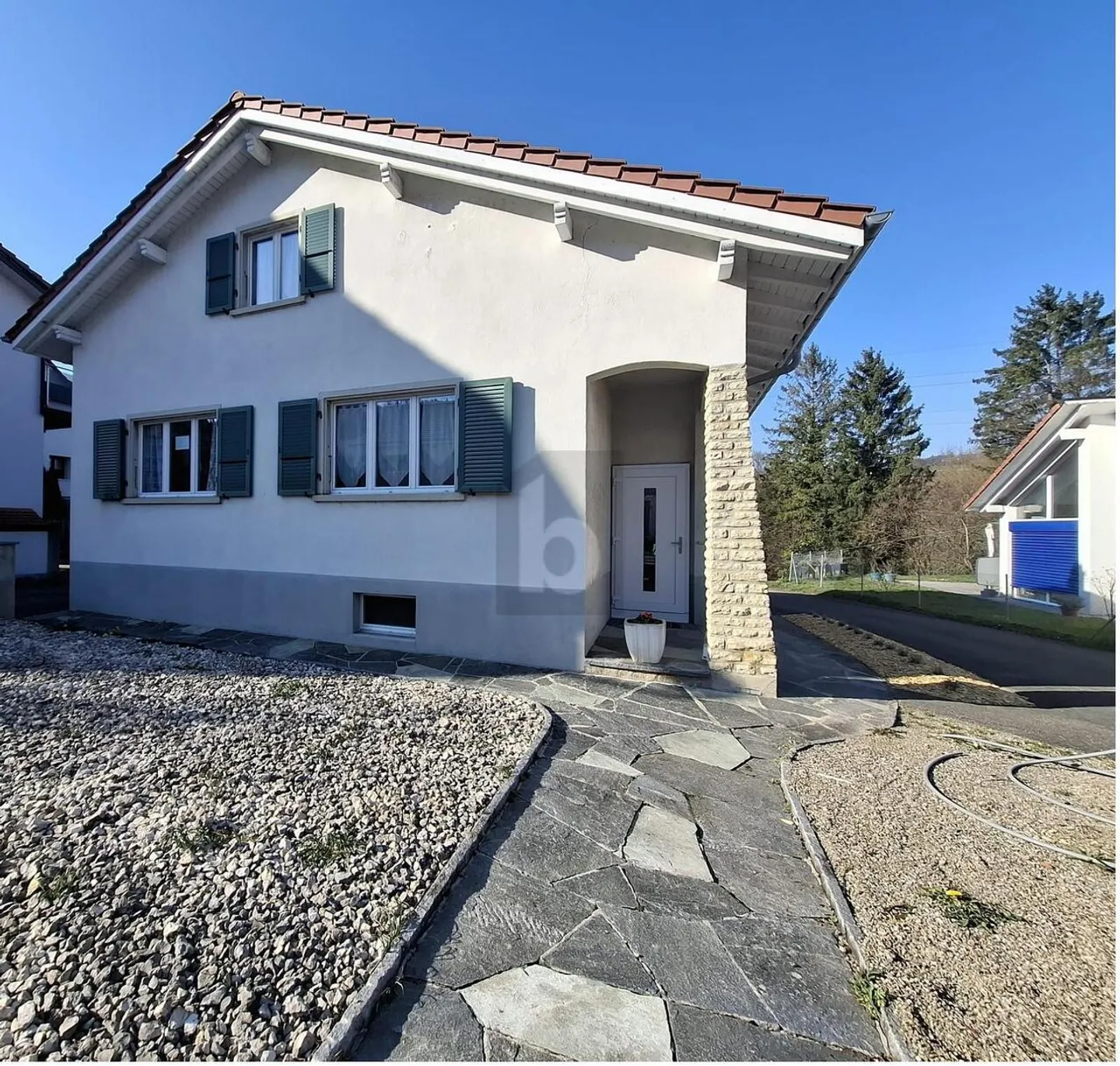 BATHED IN LIGHT AND SURROUNDED BY GREENERY - Photo 1 of 6