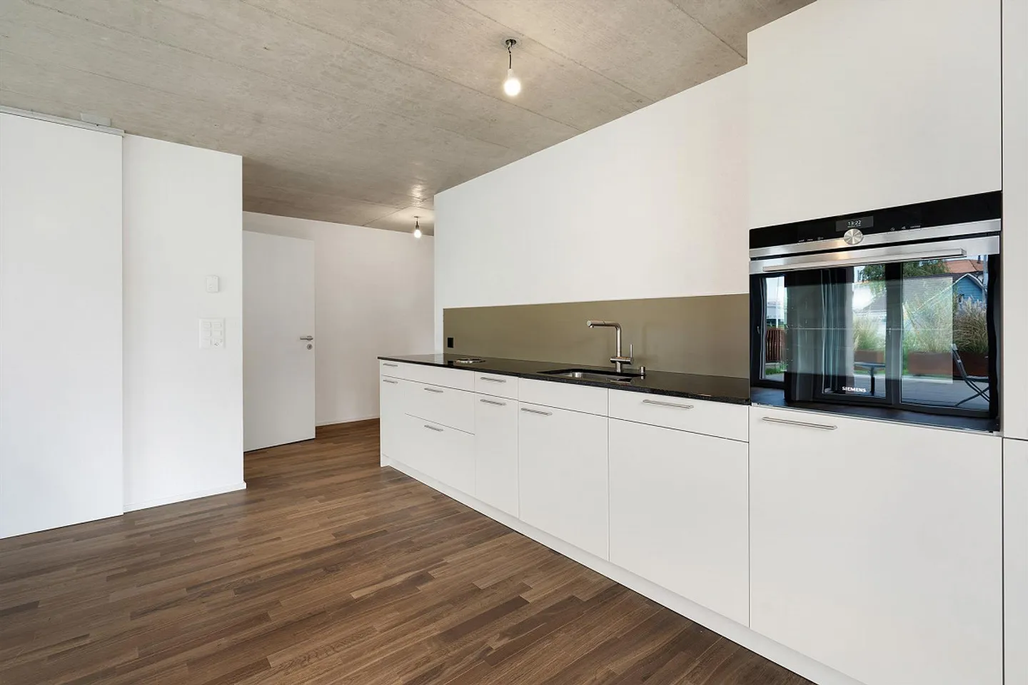 3.5 ZWG - Gartenwohnung mit Sitzplatz - Foto 10 von 18