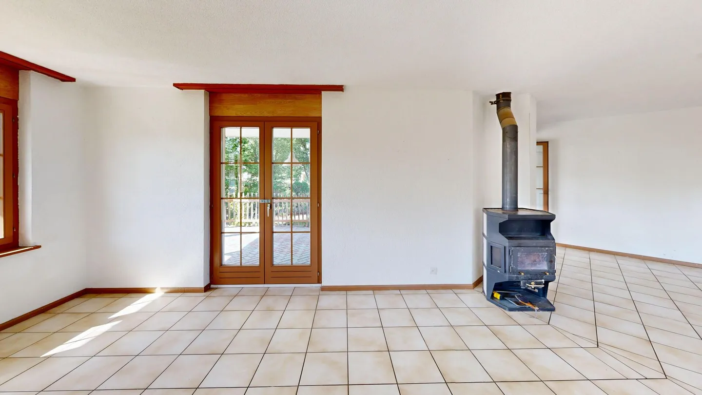 Maison individuelle de 5,5 pièces avec grand jardin et possibilités variées - Photo 6 sur 43