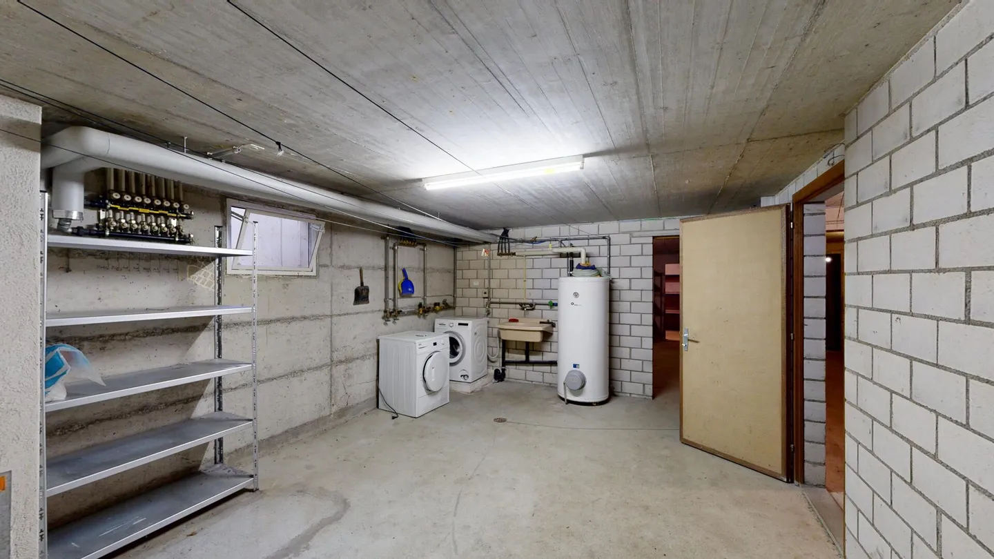 Maison individuelle de 5,5 pièces avec grand jardin et possibilités variées - Photo 32 sur 43