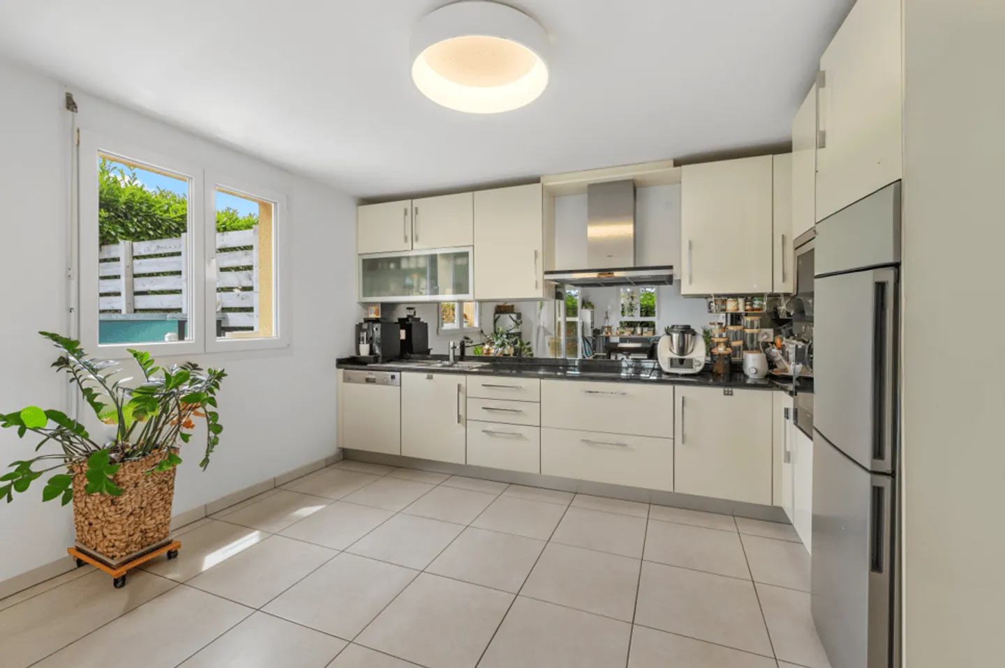 Appartement lumineux de 4.5 pièces avec jardin à Léchelles - Photo 4 of 13