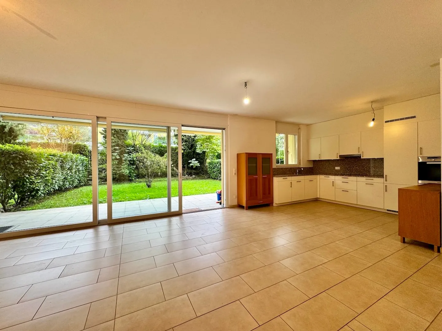 Ampio appartamento di 3,5 locali con giardino - Foto 1 di 15