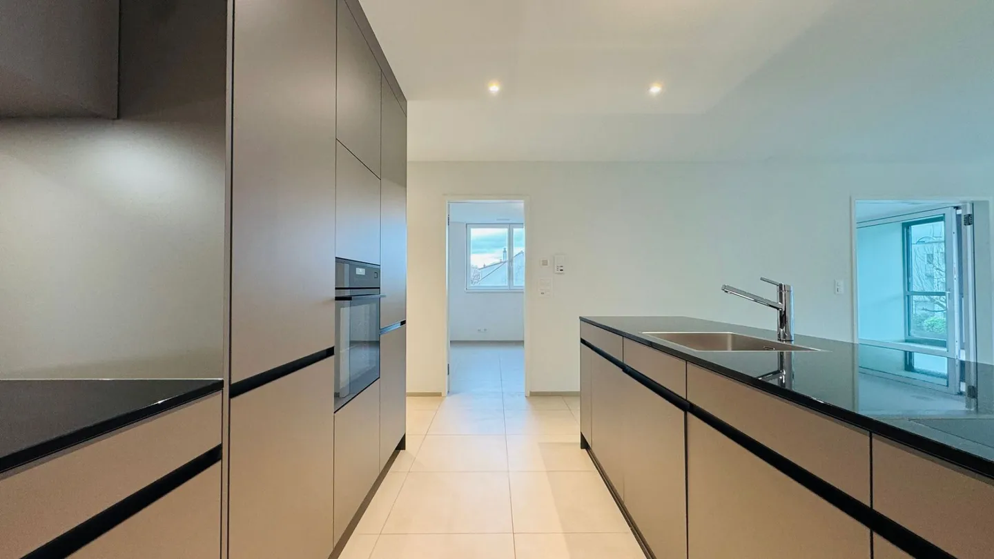 Appartamento esclusivo di 4,5 locali al 1° piano, incluso posto auto in garage sotterraneo - Foto 5 di 12