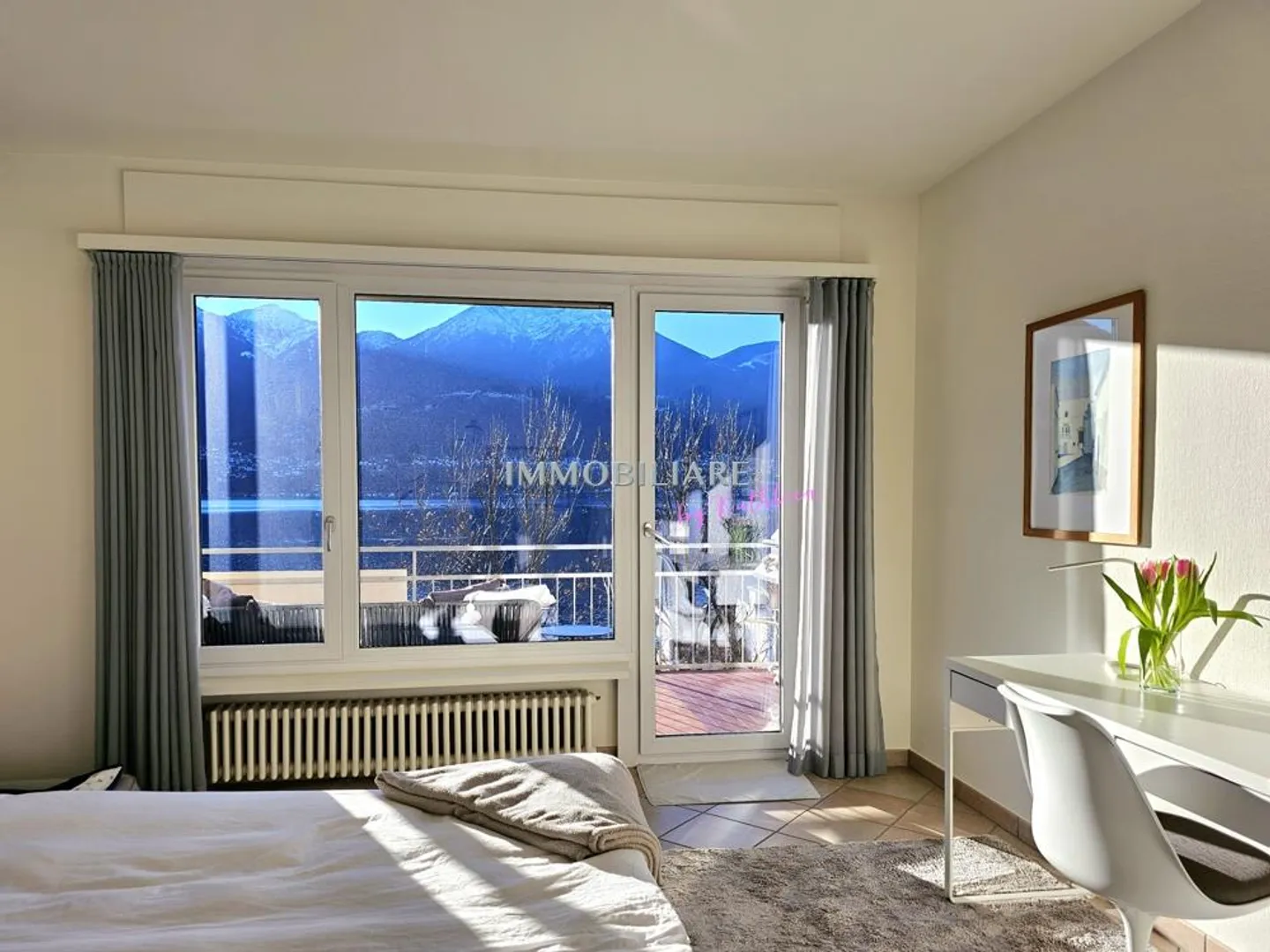 Appartamento mansardato con vista lago e camino in posizione centrale e tranquilla - Foto 6 di 22