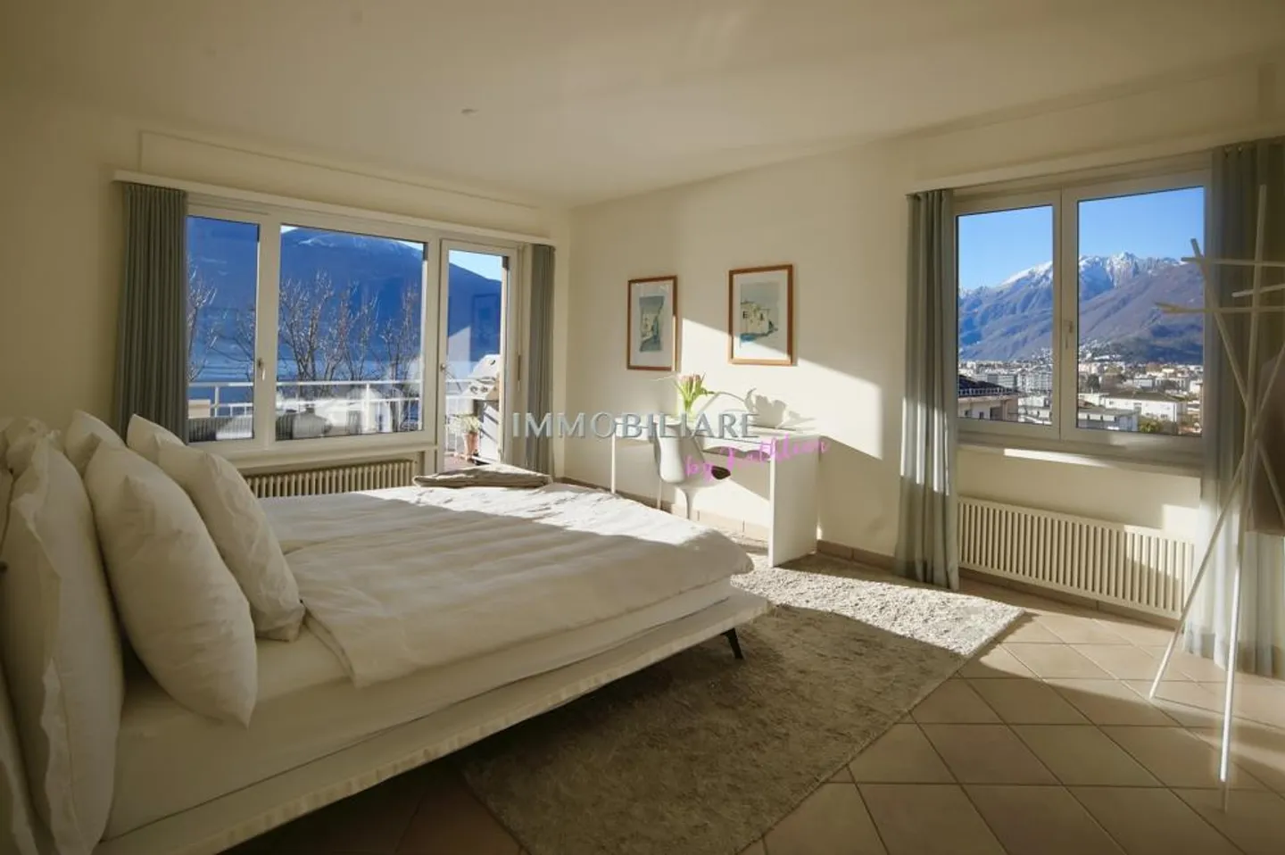 Appartamento mansardato con vista lago e camino in posizione centrale e tranquilla - Foto 10 di 22