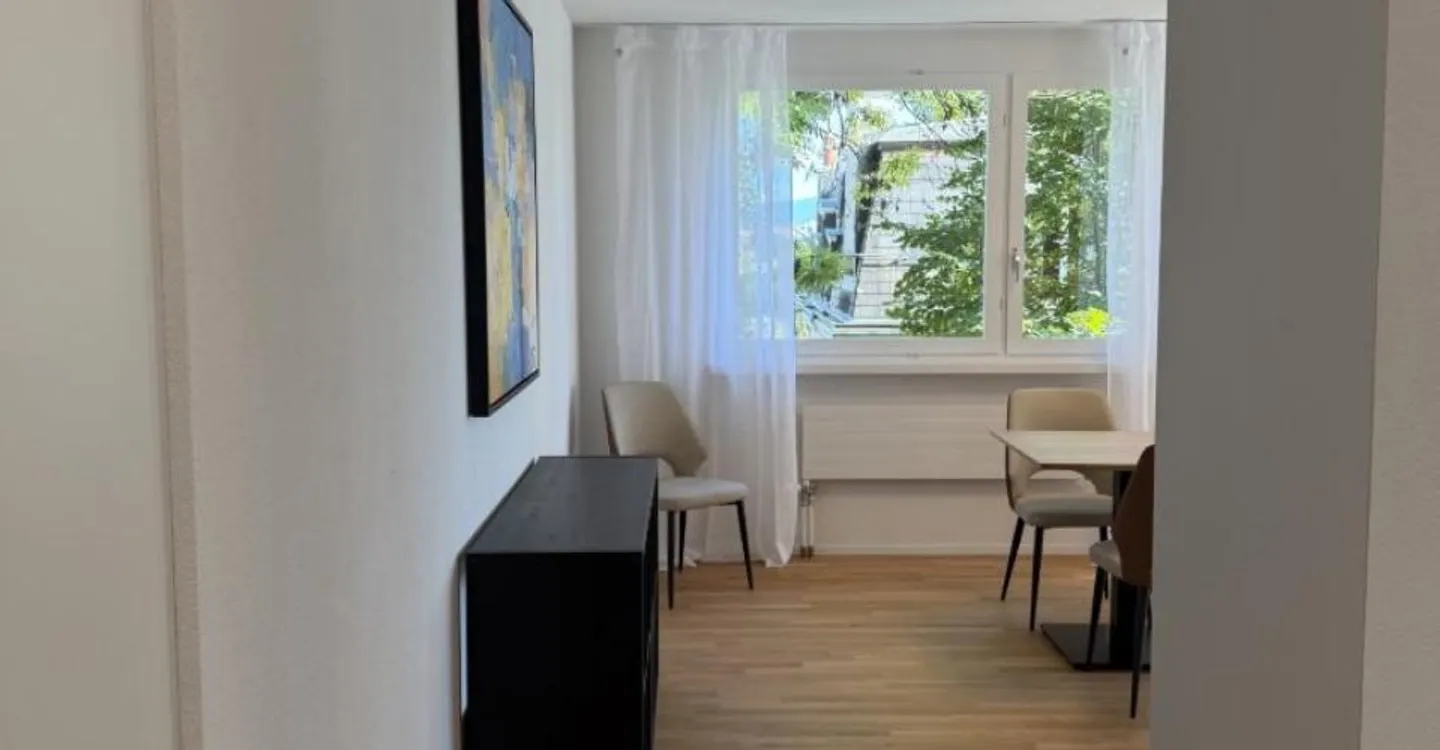 Charmant appartement 2.5 pièces - Photo 1 sur 8