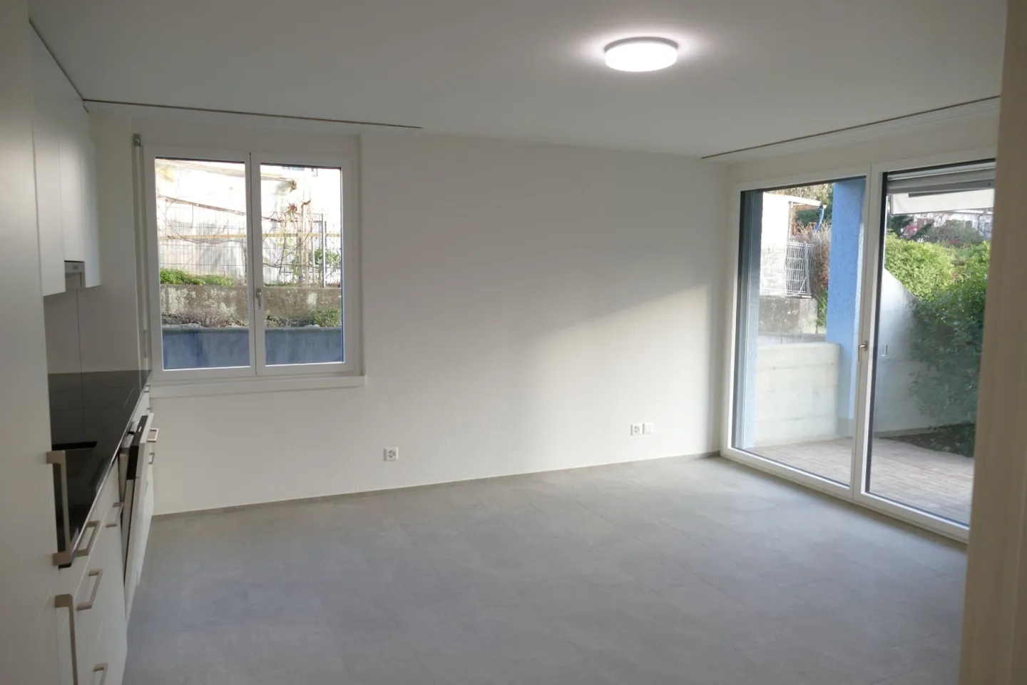 modern 2-room apartment with garden seating area - Photo 1 of 10