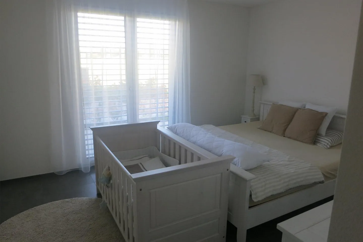 Appartamento moderno al piano terra con posti a sedere nel giardino - Foto 8 di 15