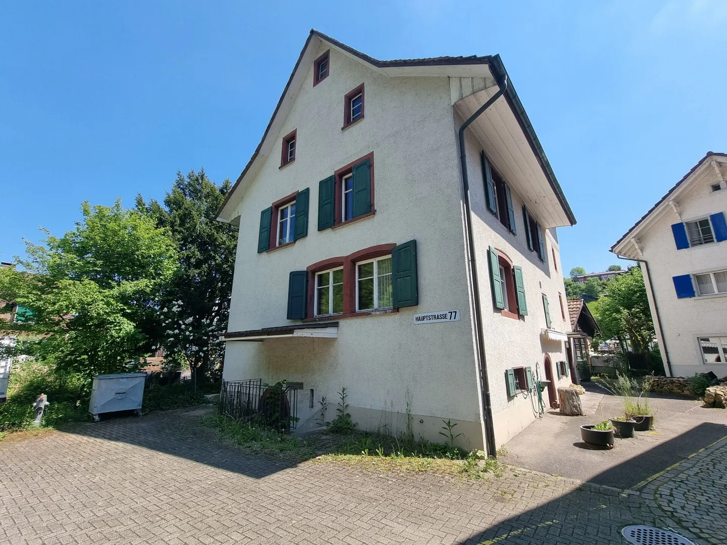 3-Familienhaus mit Mega Potenzial und 6.25% Nettorendite! - Foto 3 von 27