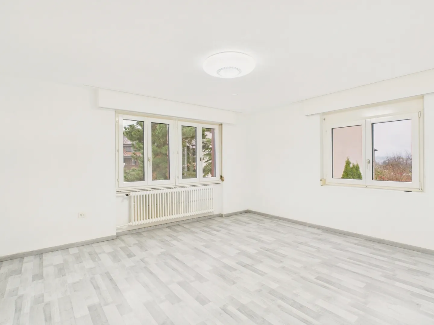 Maison individuelle de 6,5 pièces adaptée aux familles à Egolzwil avec appartement studio et oasis de jardin avec palmiers - Photo 8 sur 13