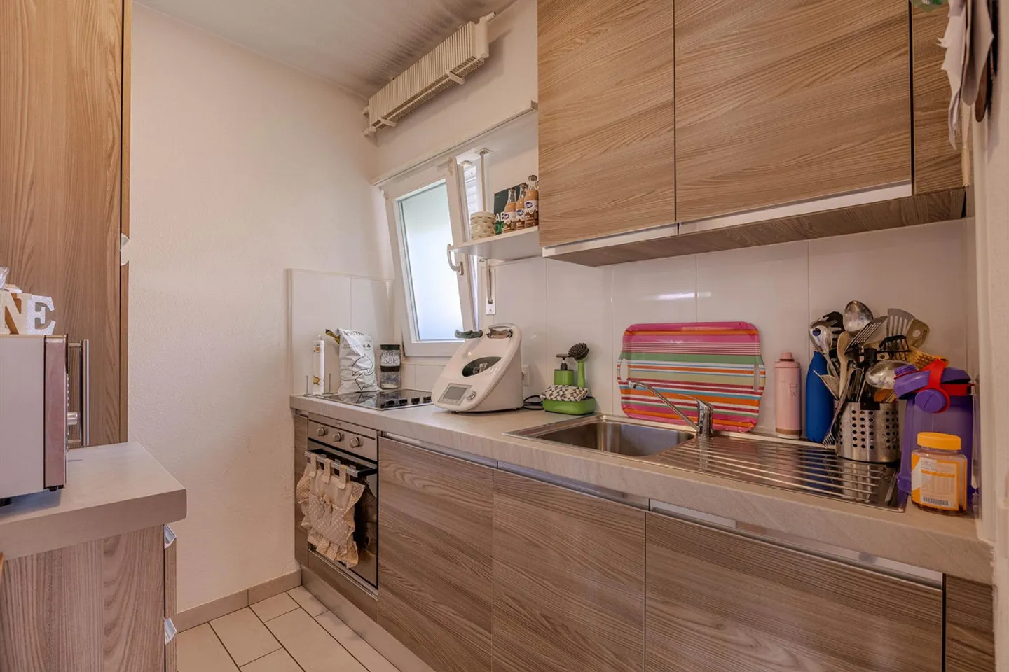 TASSO 1.07 - ACCOGLIENTE APPARTAMENTO DI 3,5 STANZE CON BALCONE AD AGNO - Foto 5 di 9