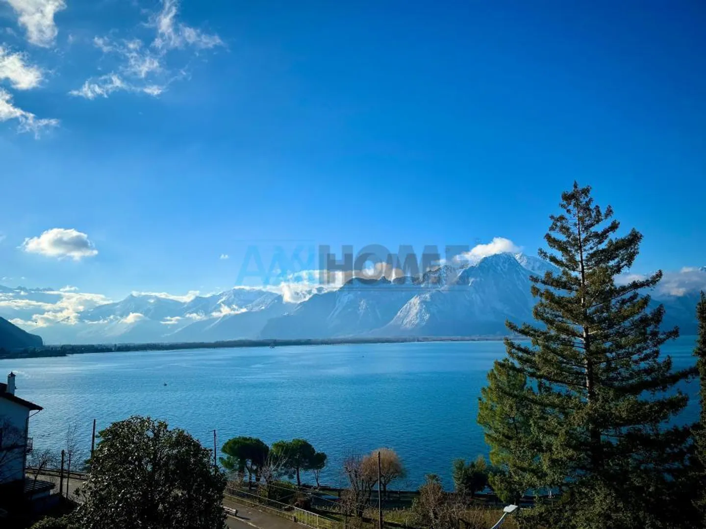EXCLUSIVELY, just steps from the lake with exceptional views - Photo 1 of 14