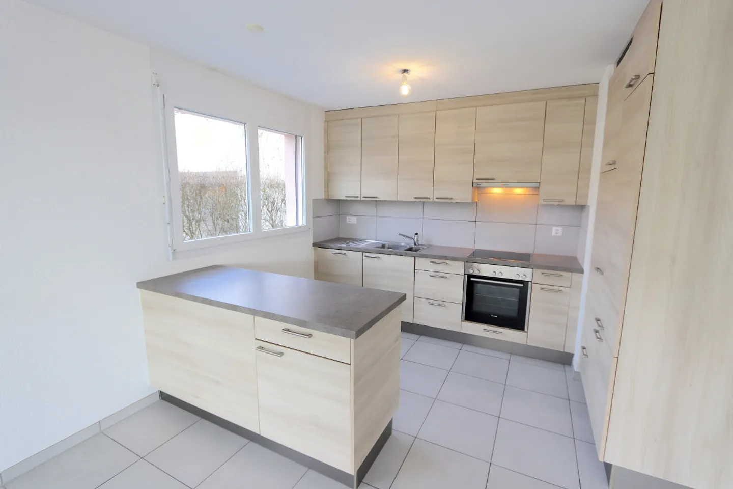 Appartamento di 3,5 locali al piano terra con giardino - Foto 4 di 8