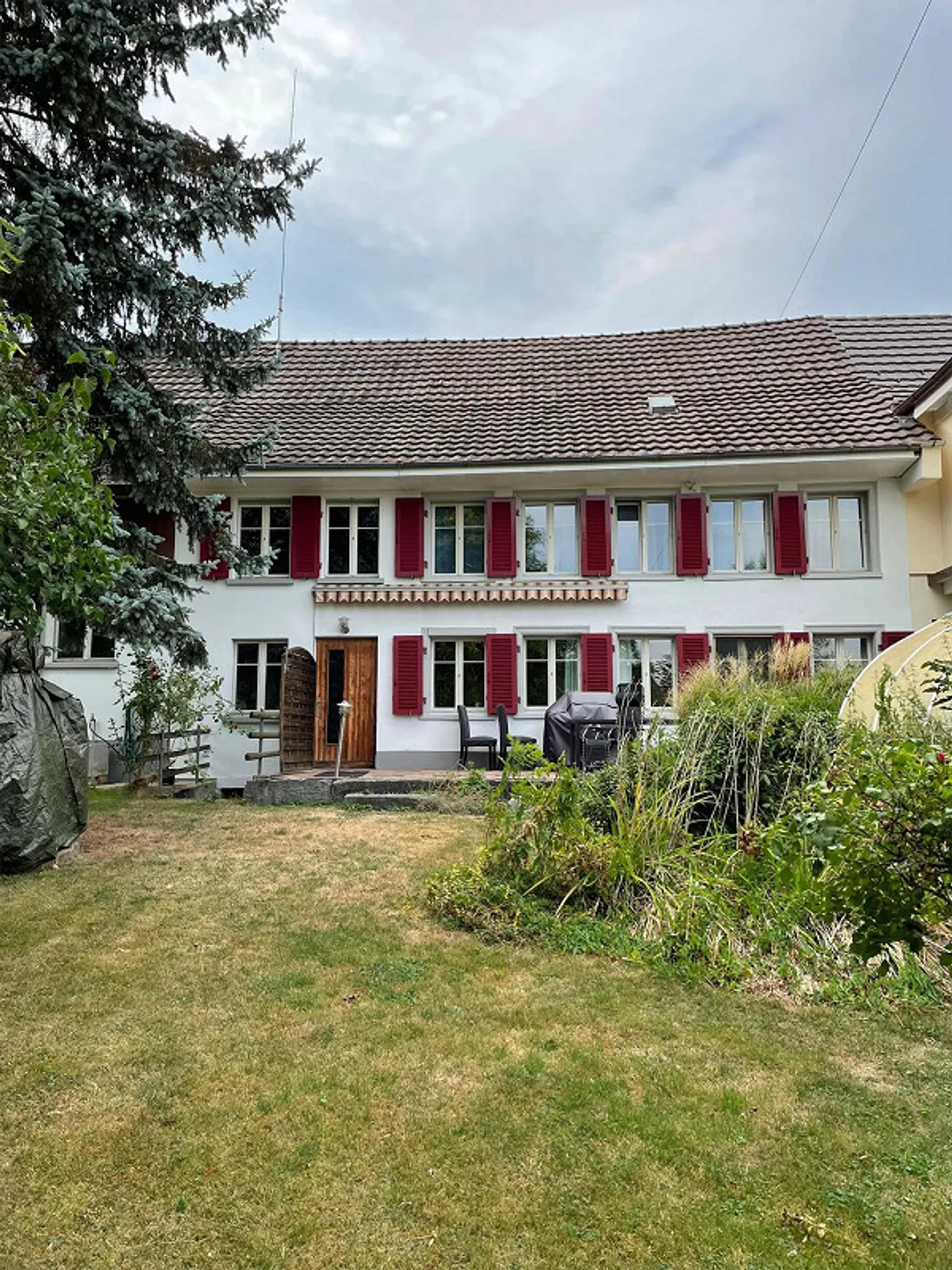 Spacious house section with garage and garden in rural area - Photo 1 of 9