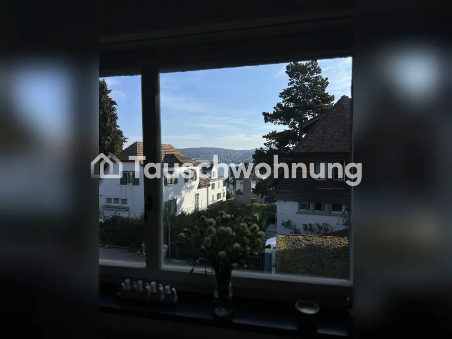 Rüschlikon: Appartamento aperto di 3 locali con giardino e vista lago - Foto 1 di 11