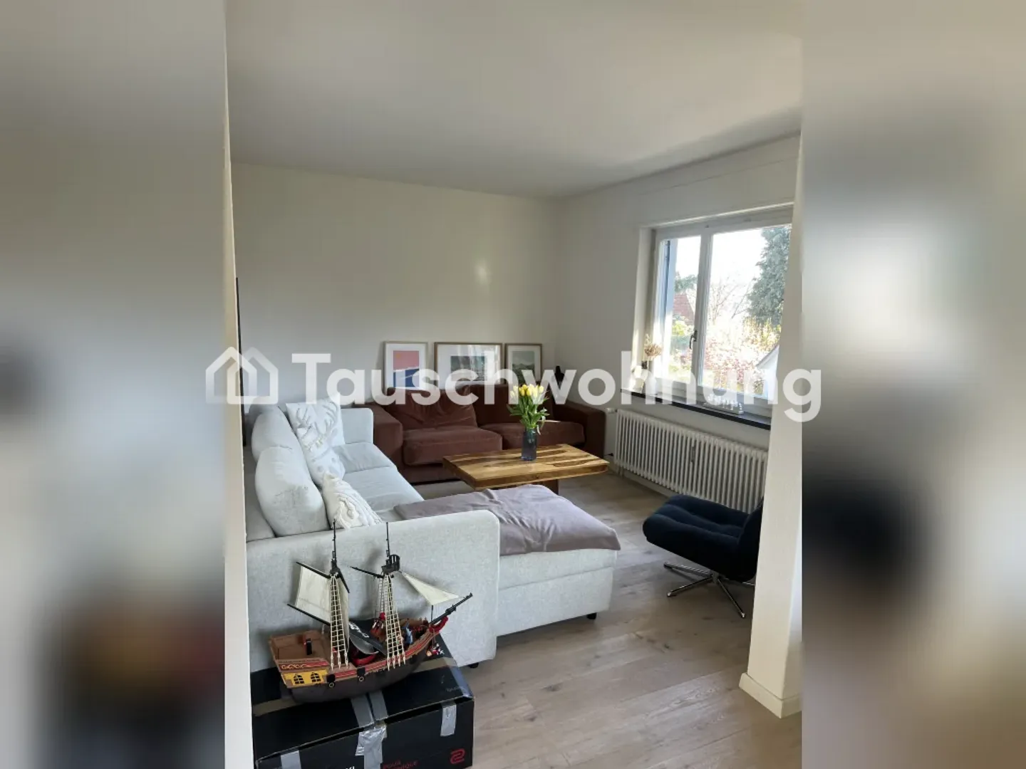 Rüschlikon: Appartamento aperto di 3 locali con giardino e vista lago - Foto 2 di 11