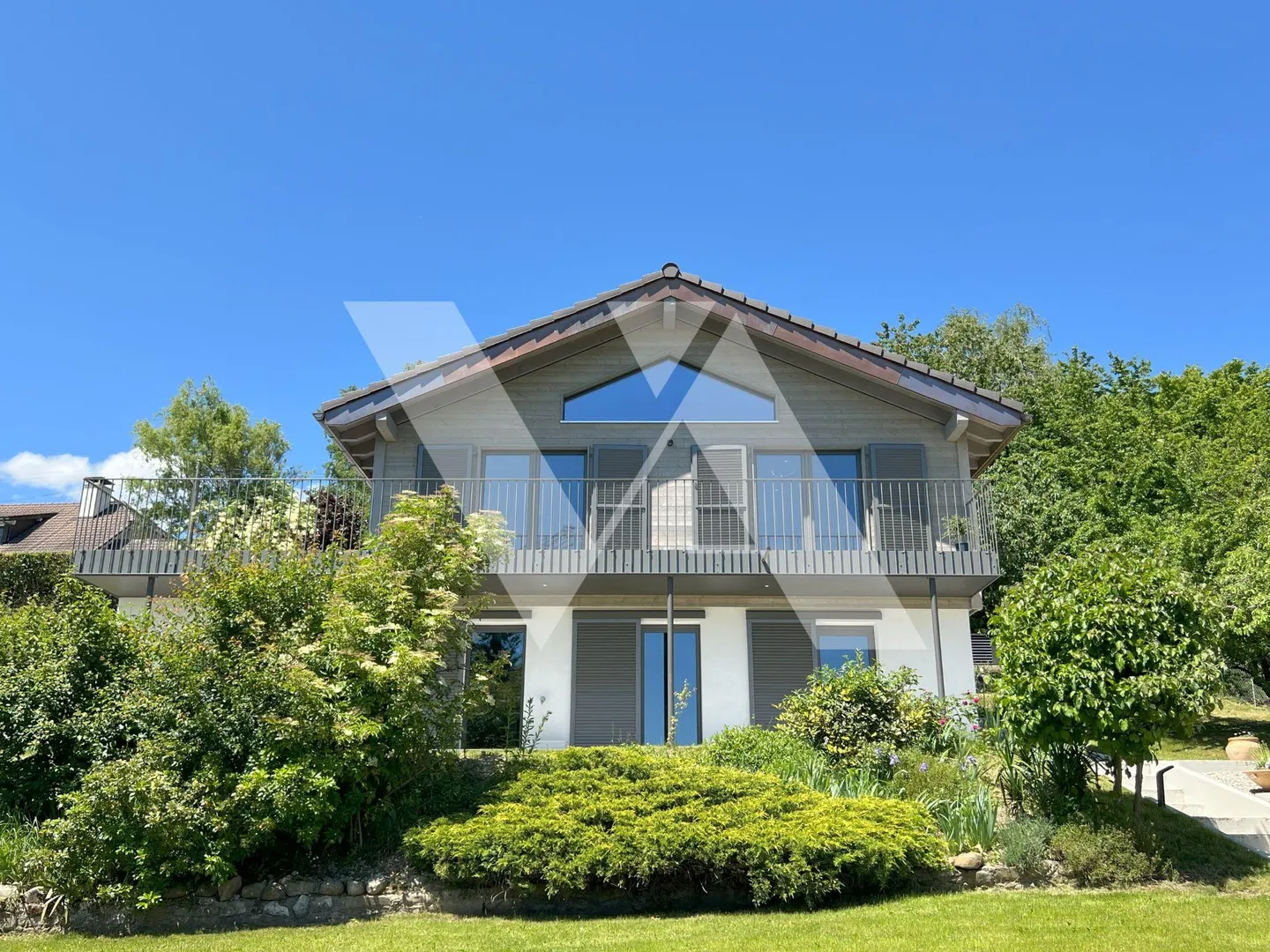 In vendita - Villa contemporanea con vista panoramica sul lago e le Alpi - Foto 1 di 12