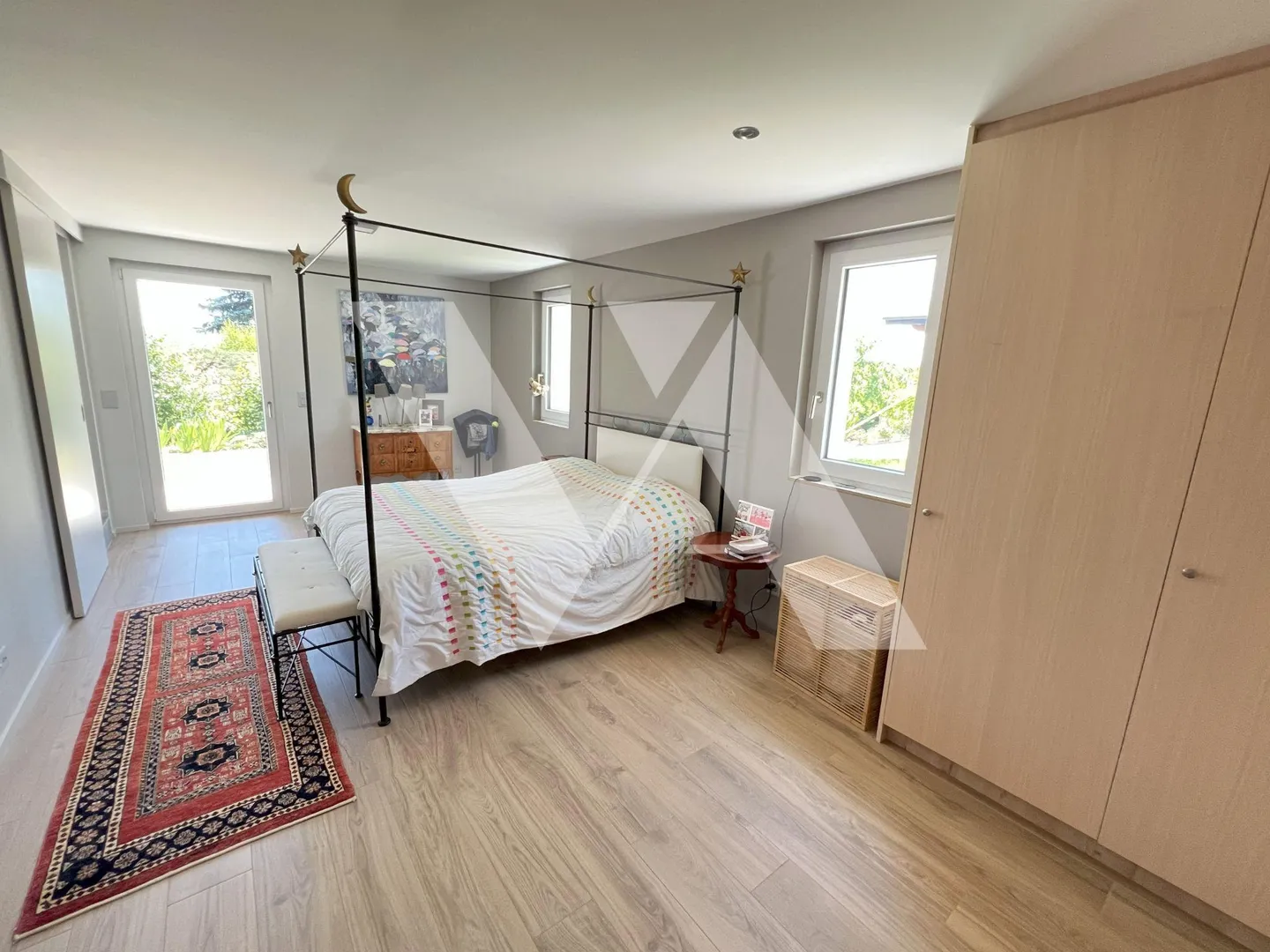 In vendita - Villa contemporanea con vista panoramica sul lago e le Alpi - Foto 7 di 12