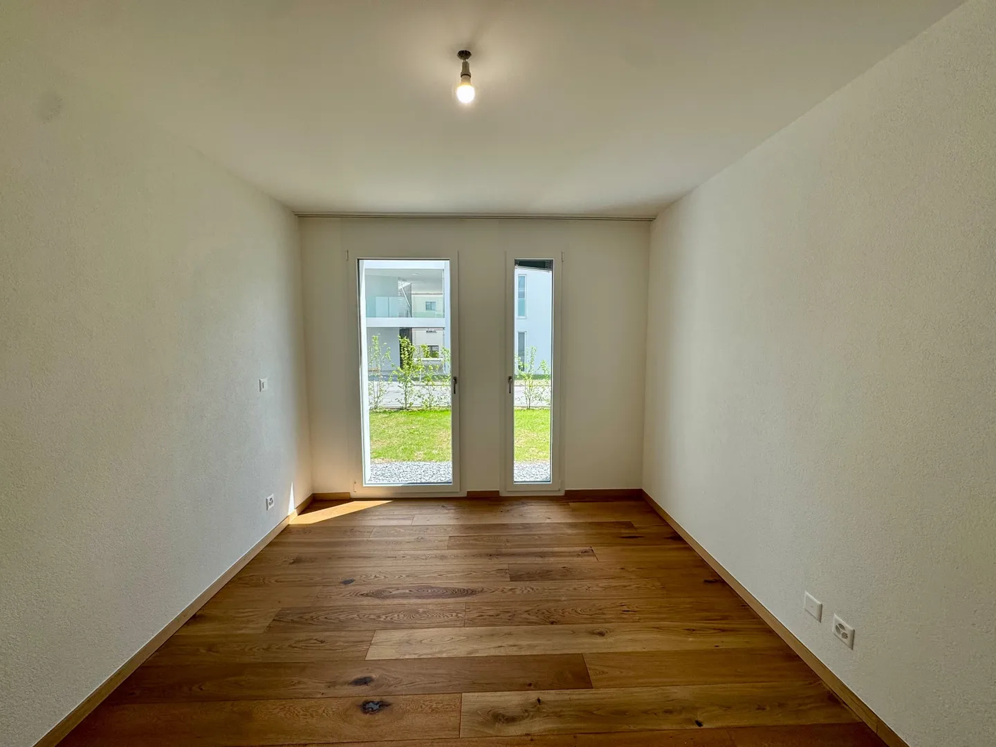 Appartement 2,5 pces neuf avec terrasse et jardin - Photo 8 of 13