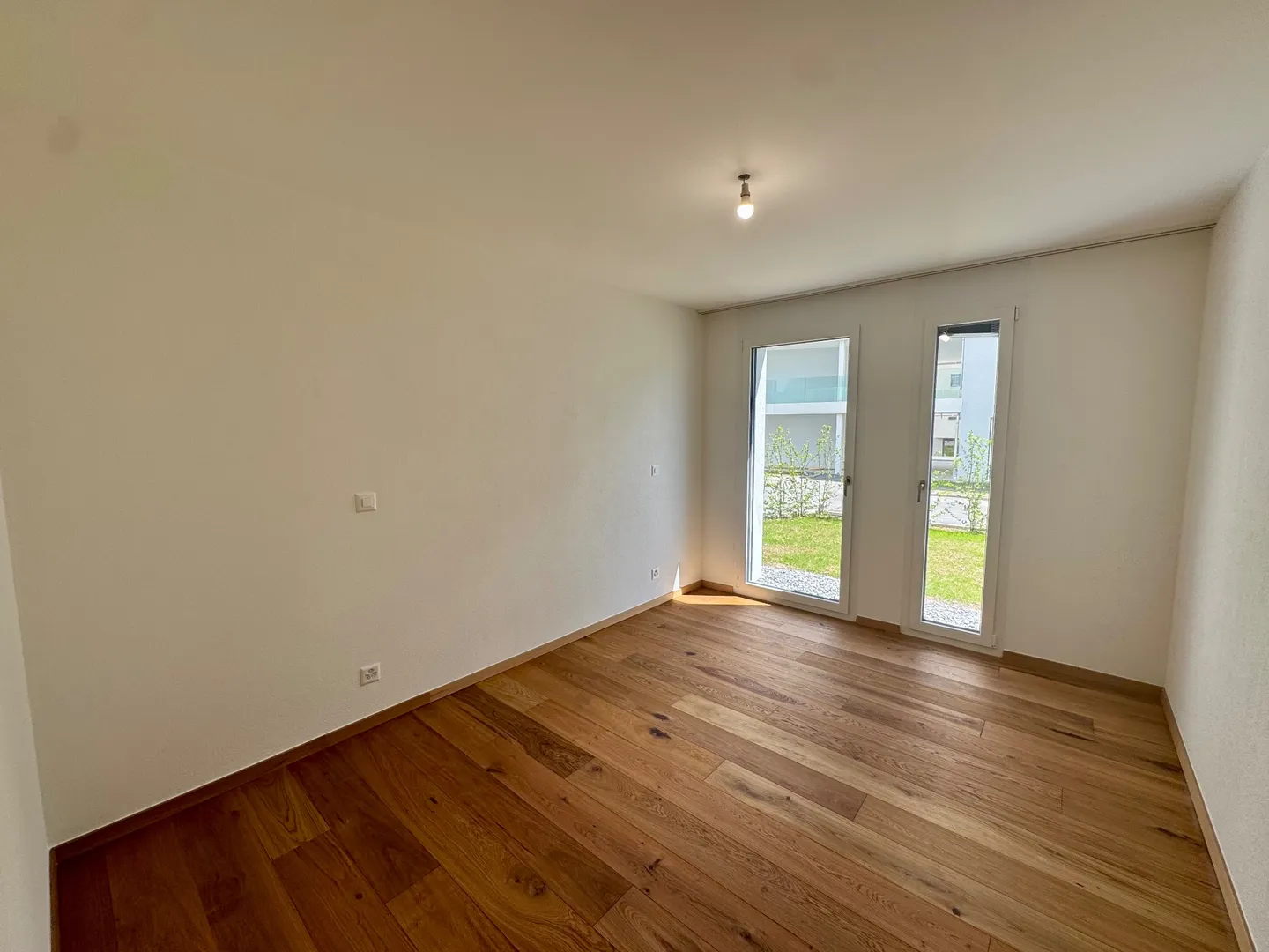 Appartement 2,5 pces neuf avec terrasse et jardin - Photo 9 of 13