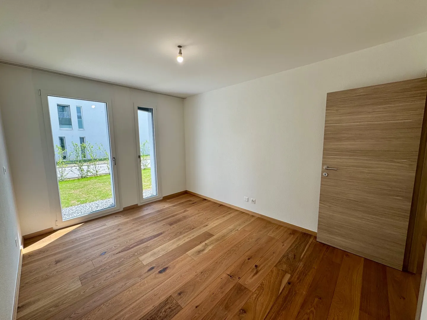 Appartement 2,5 pces neuf avec terrasse et jardin - Photo 10 of 13