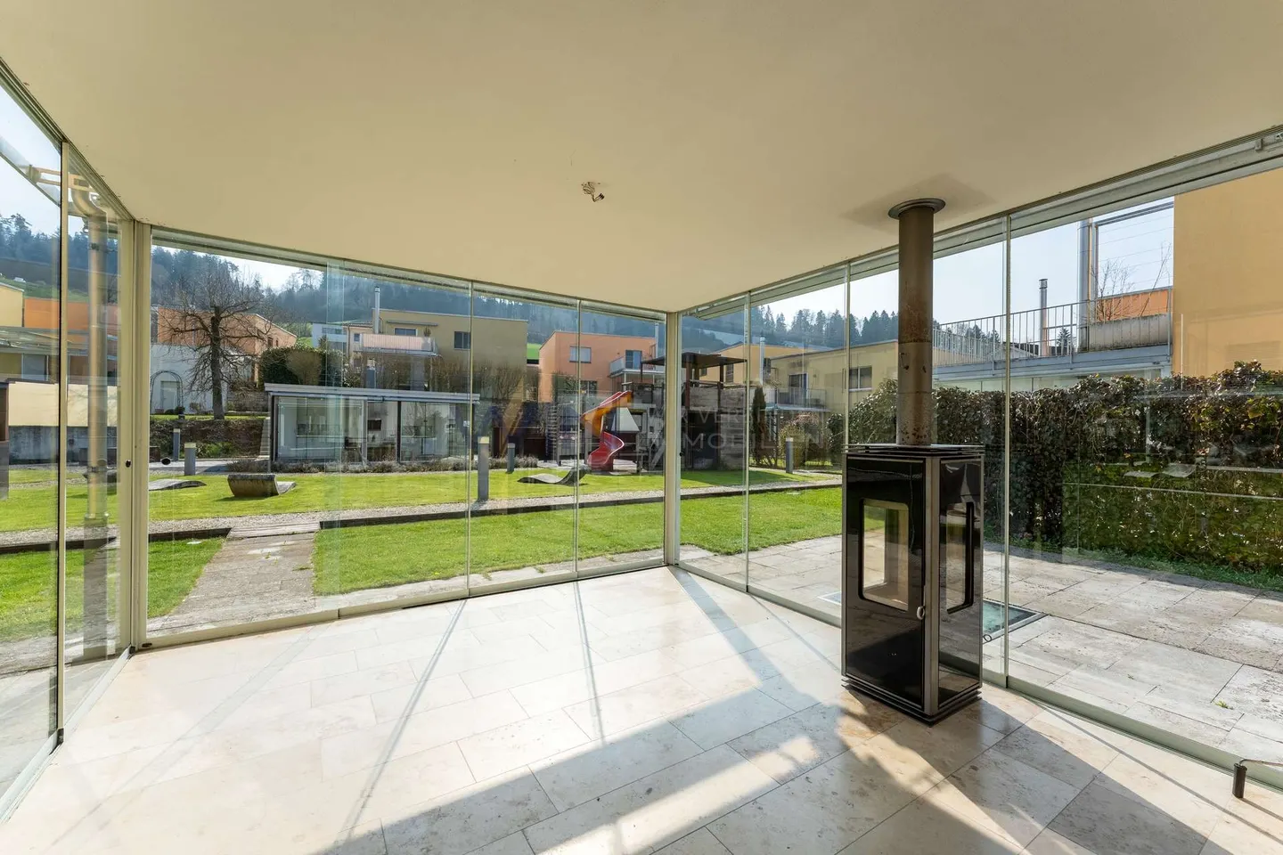 Conservatory with fireplace and garden access - Photo 1 of 5