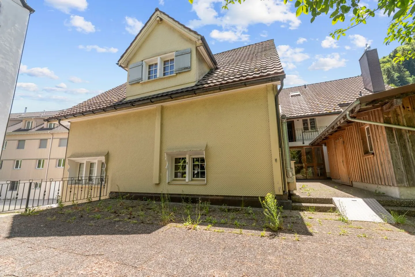 Residential & Commercial Building with Development Potential in Brunnadern - Photo 4 of 13