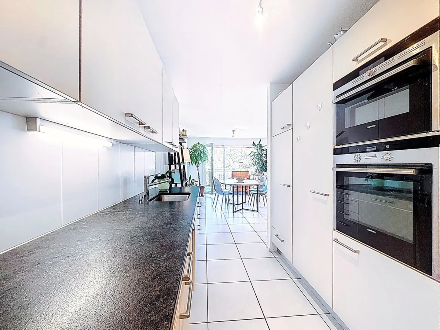 Bright 4.5-room duplex with south-facing balcony and unobstructed view - great opportunity in Belfaux - Photo 3 of 13