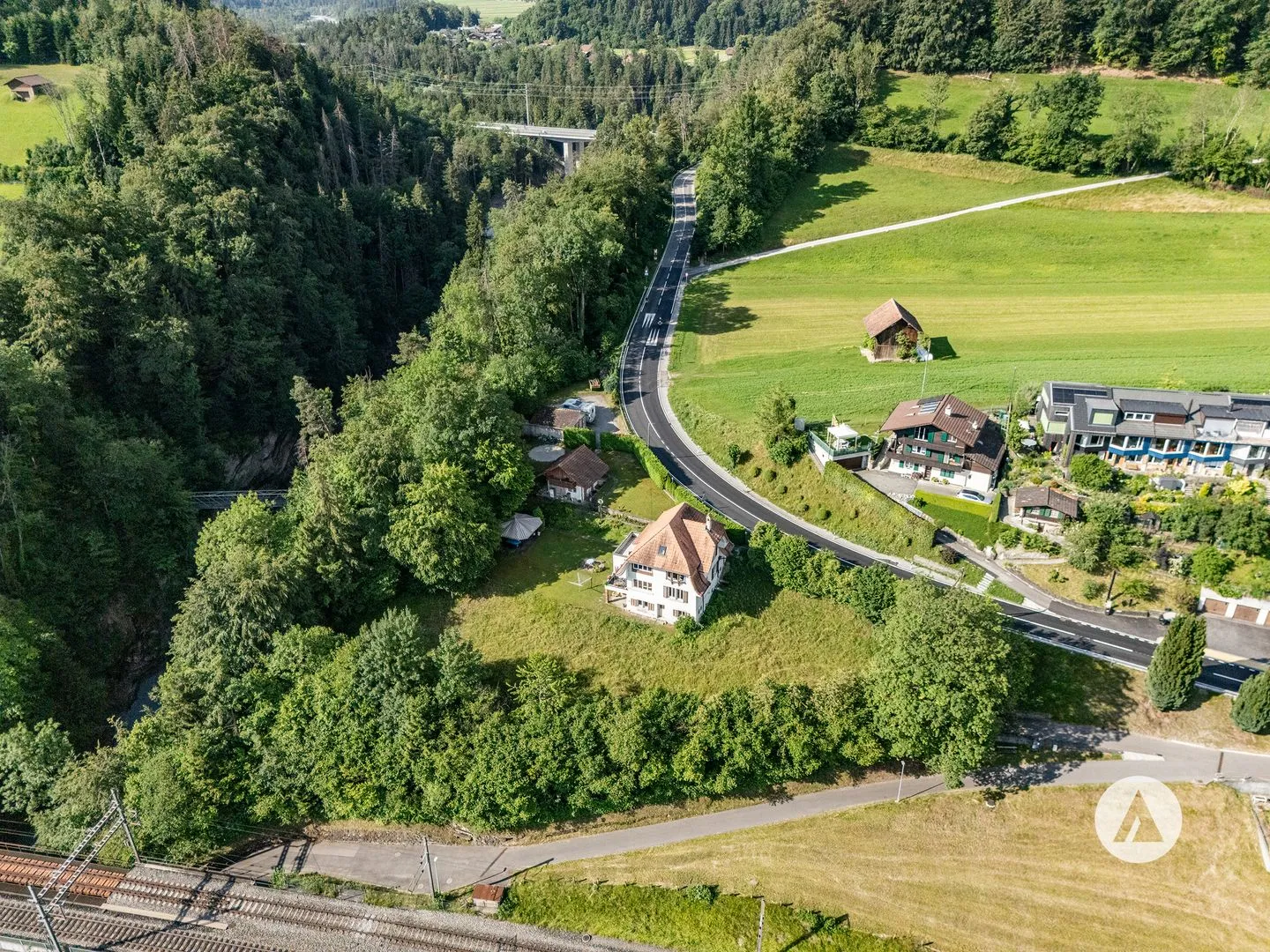Building land between lake and forests - Photo 1 of 11