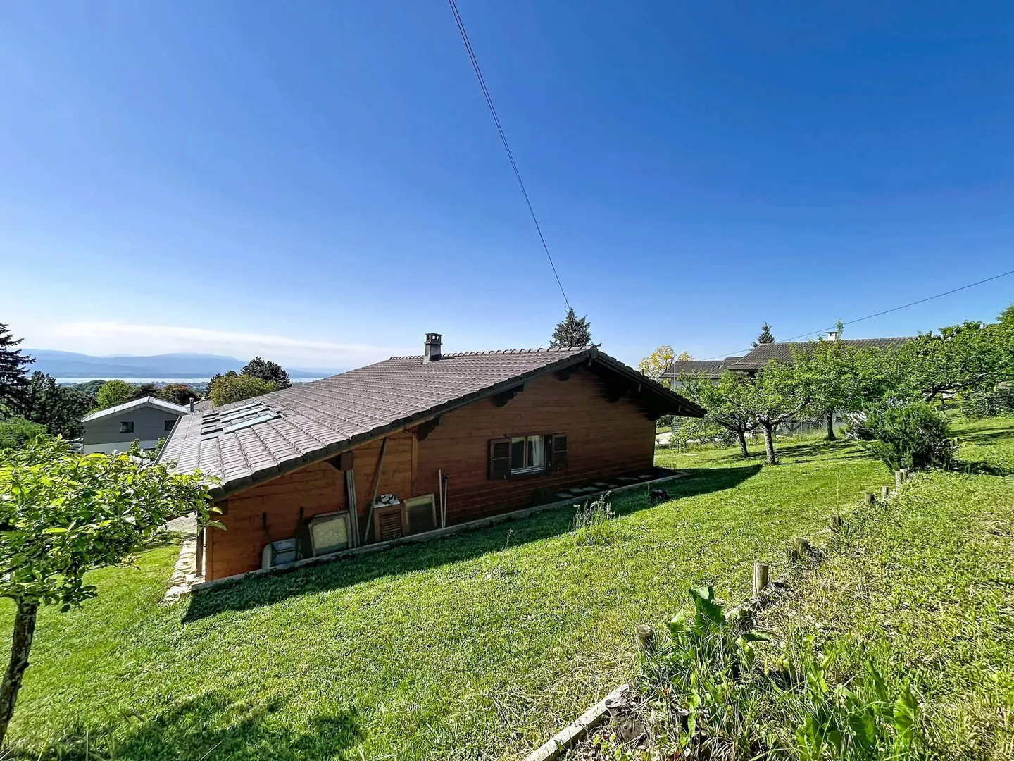 Parzelle mit Chalet in einer grünen Umgebung und Seeblick - Foto 4 von 7