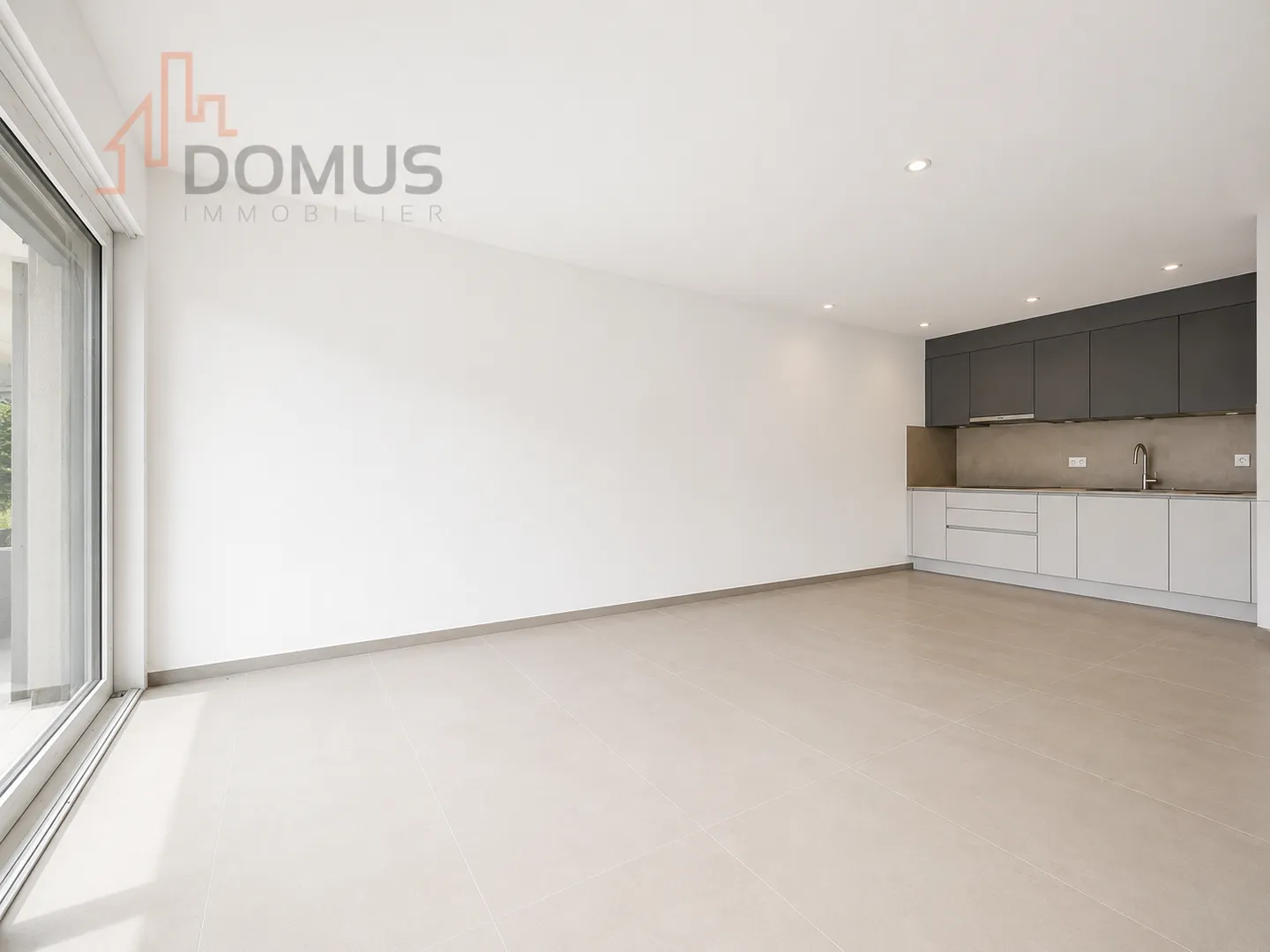 Appartement de rendement avec grande terrasse ouest - Photo 2 sur 13