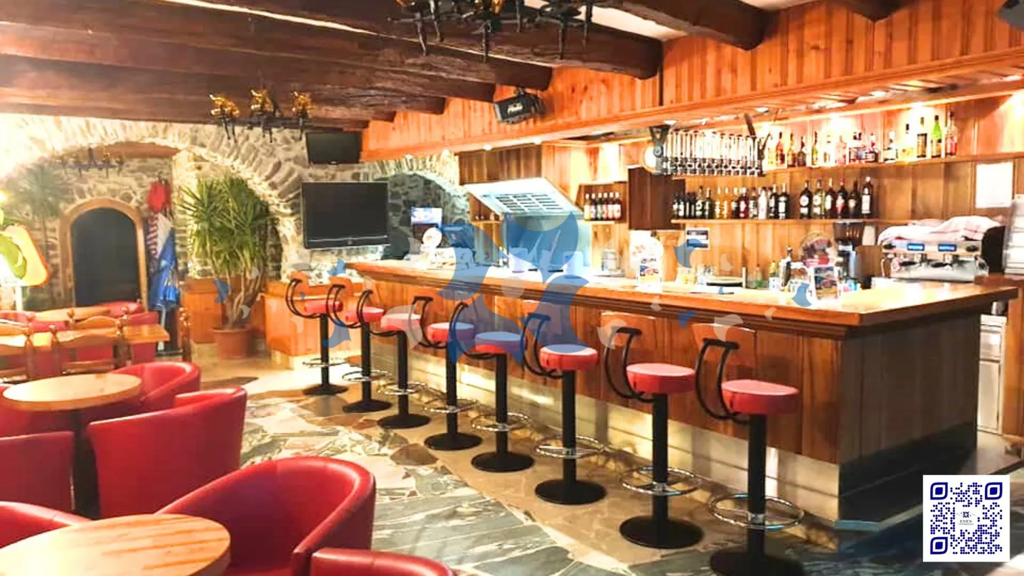 À vendre - Bar voûté en pierres apparentes à Saint-Maurice (VS) - Rentabilité immédiate avec bail en cours - Photo 1 sur 3