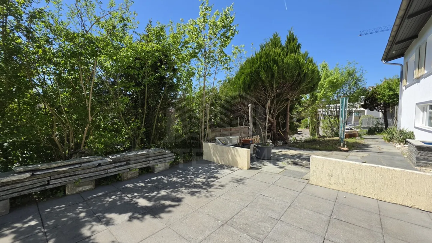 Maison individuelle baignée de lumière avec un grand jardin d'hiver - Photo 13 sur 13